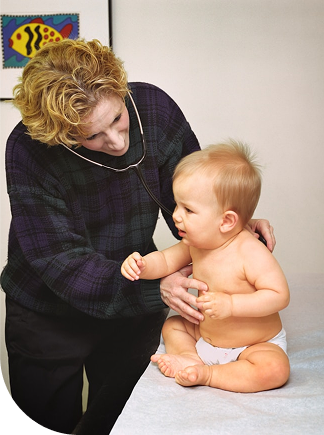 Medical professional examining baby